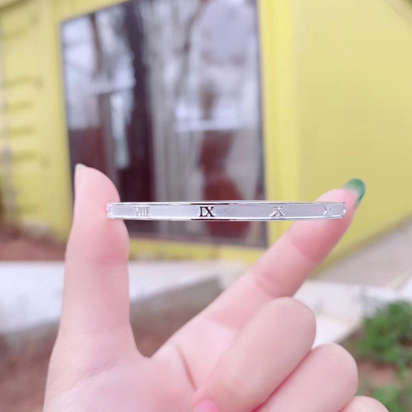 Roman number closed loop sterling silver bracelet