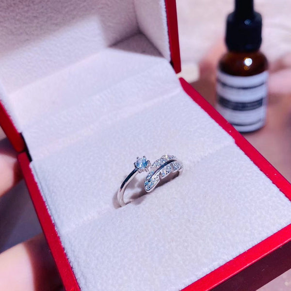 Round CZ Solitaire & CZ Feather Sterling Silver Open Ring