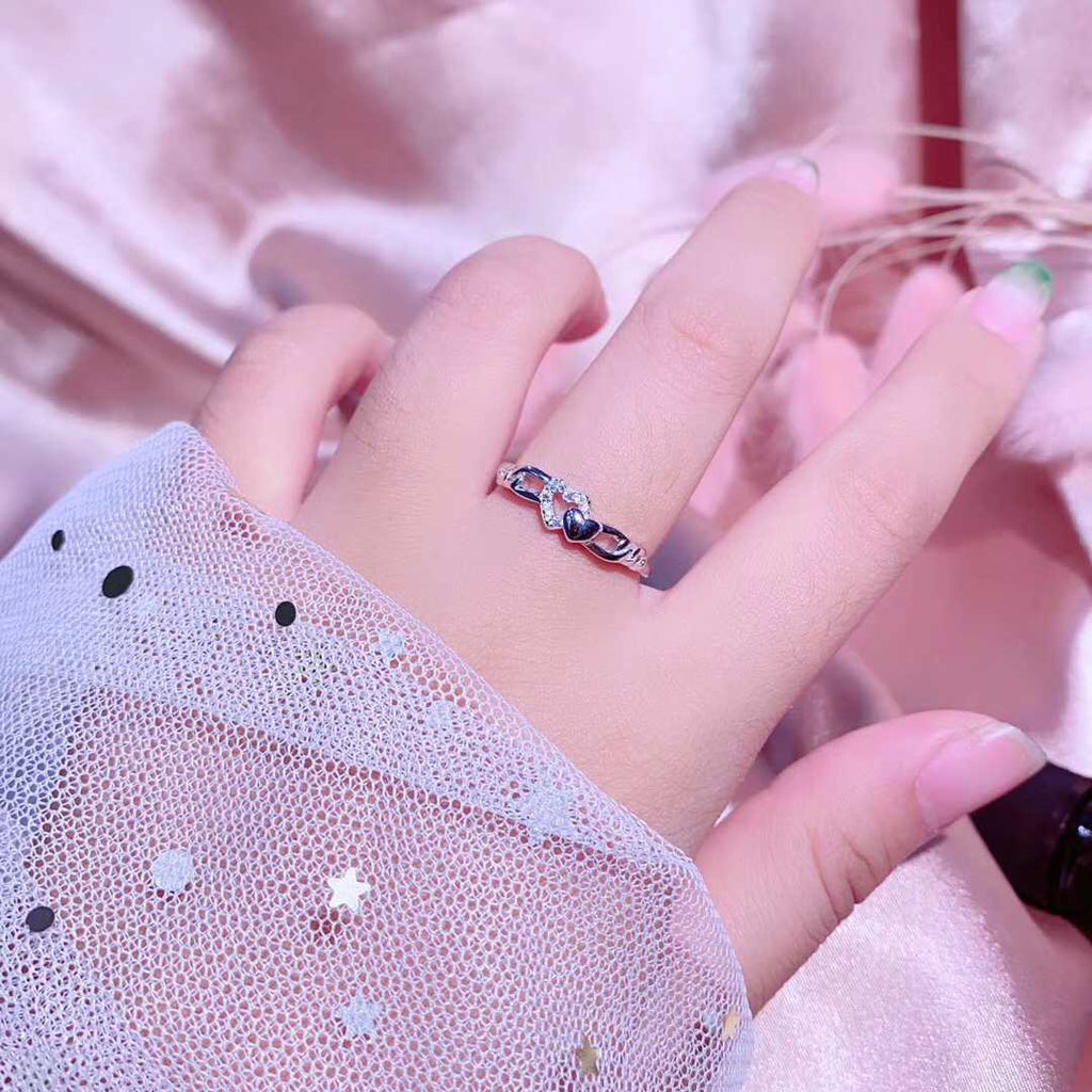 Silver ring best sale with two hearts